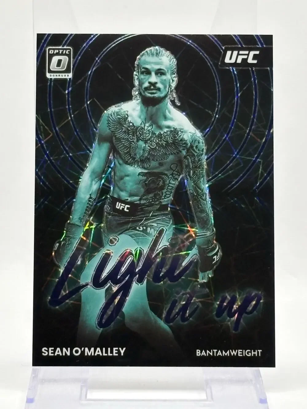 2023 Panini Optic UFC Sean O’Malley Light It Up Purple Velocity Refractor /59 SP